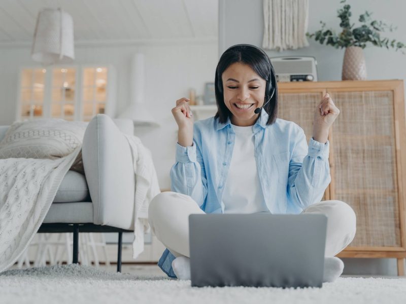 friendly-woman-coach-in-headset-working-online-on-laptop-conducts-webinar-at-home-elearning.jpg